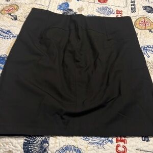 The limited black skirt size 12